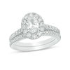 Thumbnail Image 0 of Celebration Ideal 1-1/2 CT. T.W. Oval Diamond Frame Bridal Set in 14K White Gold (I/I1)