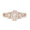 Thumbnail Image 4 of Celebration Ideal 1 CT. T.W. Oval Diamond Three Stone Frame Engagement Ring in 14K Rose Gold (I/I1)